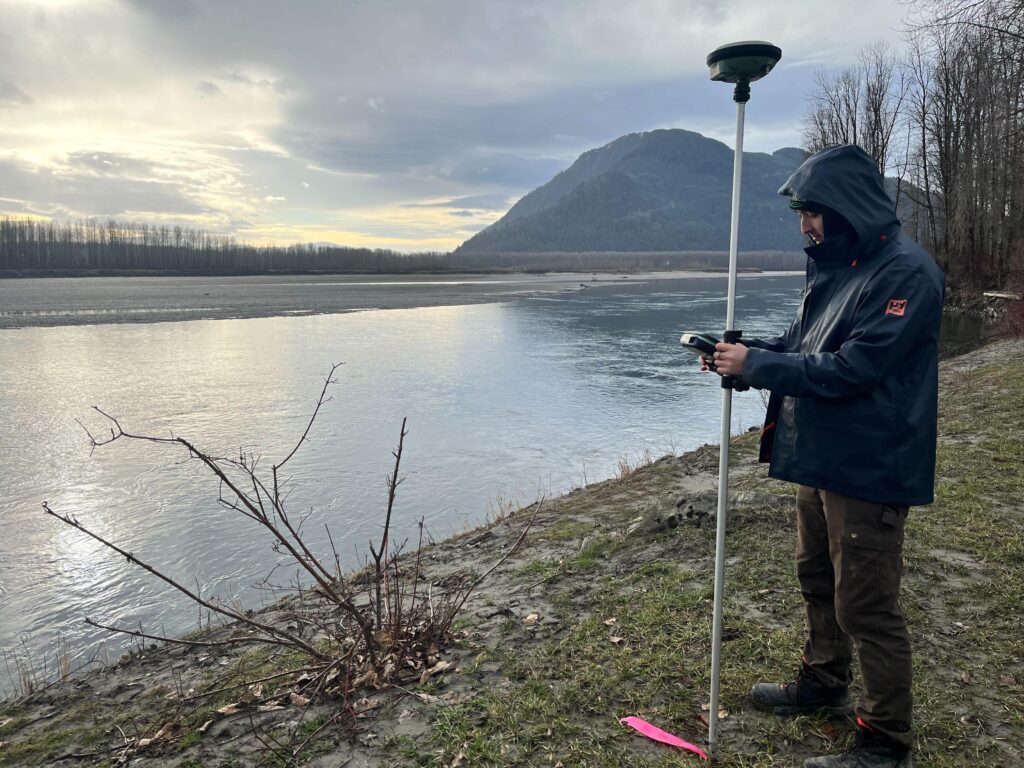 Technician performing a topographic survey
